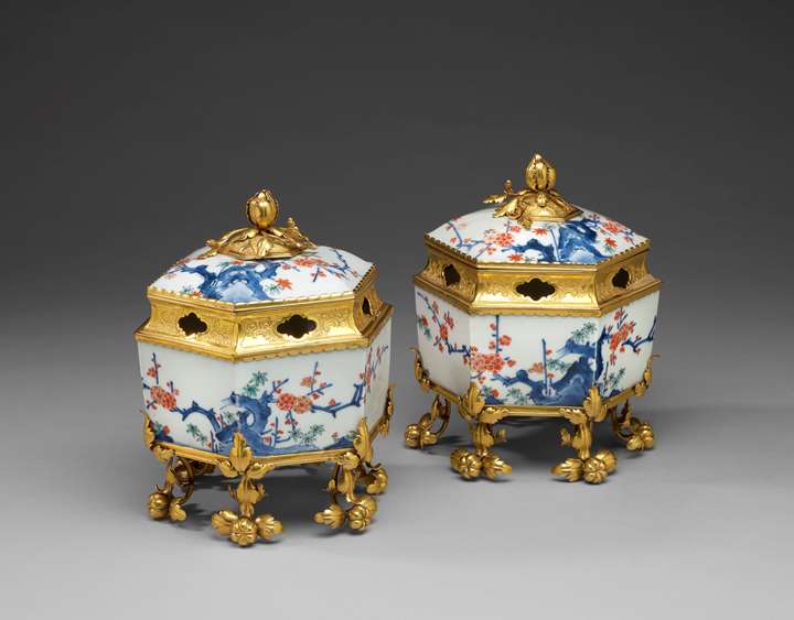 A pair of ormolu mounted Japanese hexagonal pot-pourri vases with covers